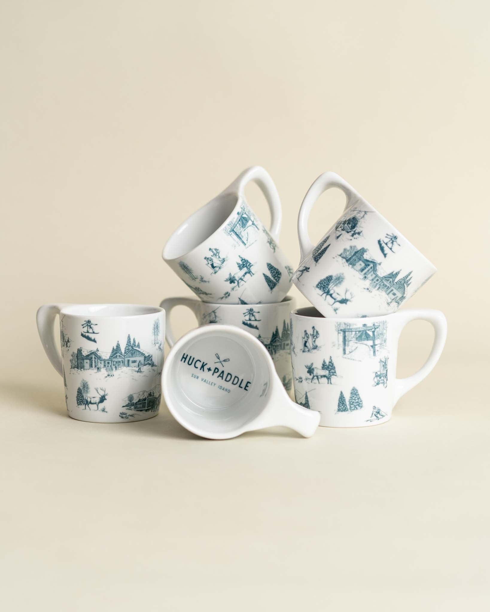 http://huckandpaddle.com/cdn/shop/products/hp-mugs-winter-toile-428636.jpg?v=1694023598